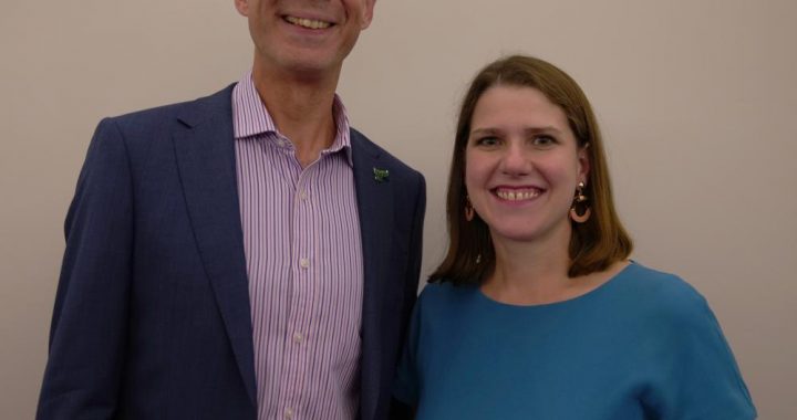 Matthew standing with Jo Swinson